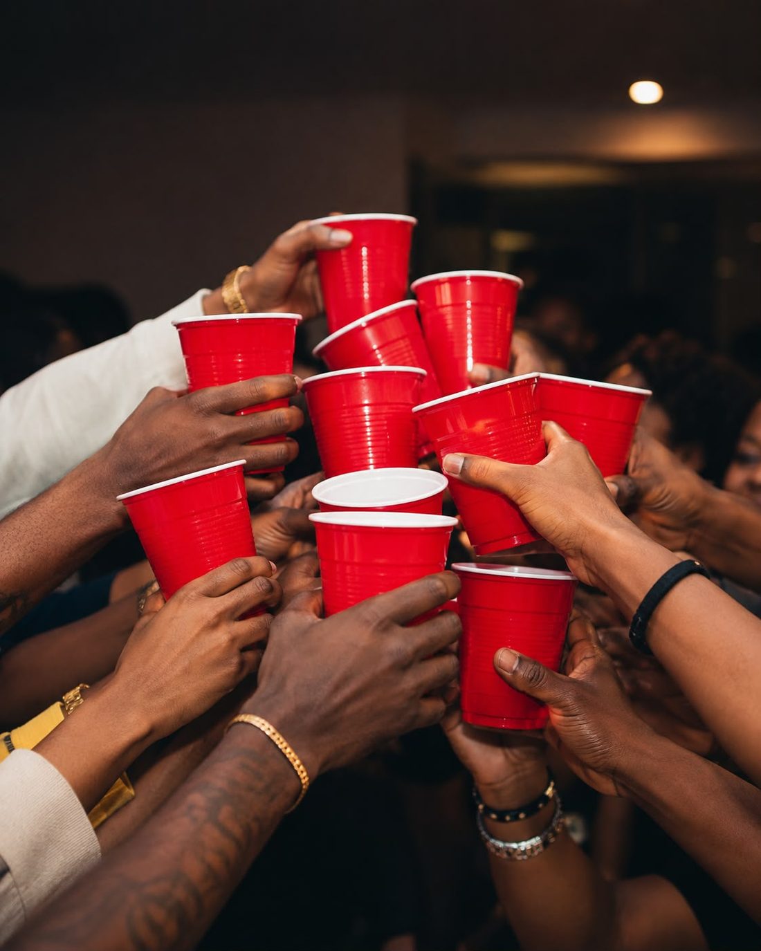 Red cups raised at a J Entertainment house party